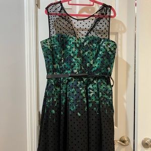 Green and black cocktail dress